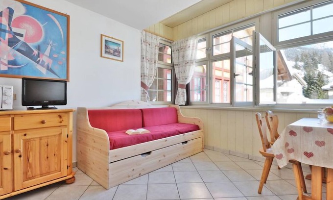 Campitello di Fassa Apartment | Stay at Apt 24 by Interhome: Pet-Friendly Lake View Retreat
