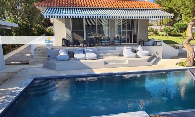 Porto Rafti Villa | Escape to Villa PortoMare: Oceanfront Bliss Awaits