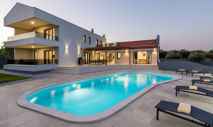 Peruski Villa | Villa Posidonia: Oceanview Retreat Surrounded by Olive Trees