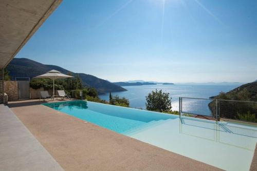 Evgiros Villa | Villa Posidonia: Scenic Views & Saltwater Pool Oasis