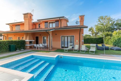 Rosolina Villa | Family-Friendly Villa Quadrilocale V4P with Pet Amenities