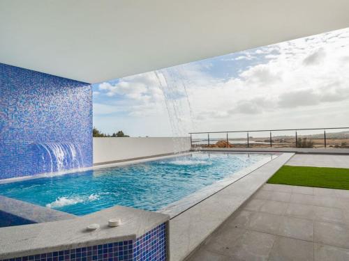 Portimao Villa | Villa Ria Alvor: Poolside Oasis with Oceanfront Views