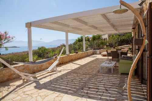 Halki House | Beachfront Villa Romanza: Pet-Friendly Ocean View Retreat
