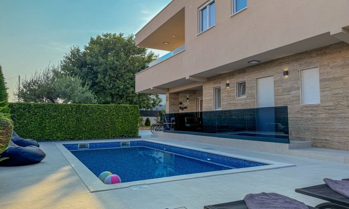 Kastel Stafilic Villa | Villa Rozzaria: Beachside Retreat with Hot Tub & Pool