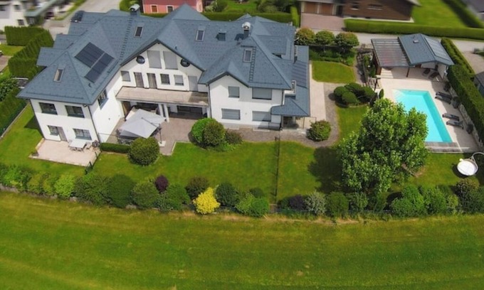 Seekirchen am Wallersee Villa | Villa Seekirchen: Exclusive living with private pool and garden for families