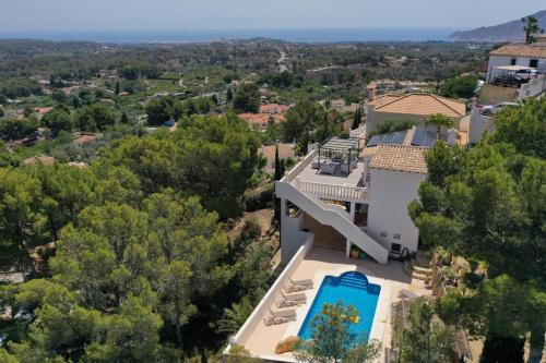 La Nucia Villa | Elegant Villa Santorini: Oceanfront Retreat with Pool