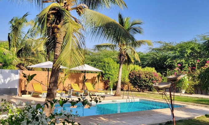 Nianing Villa | Relax at Villa Sarrène: Family-Friendly with Pool & Hot Tub