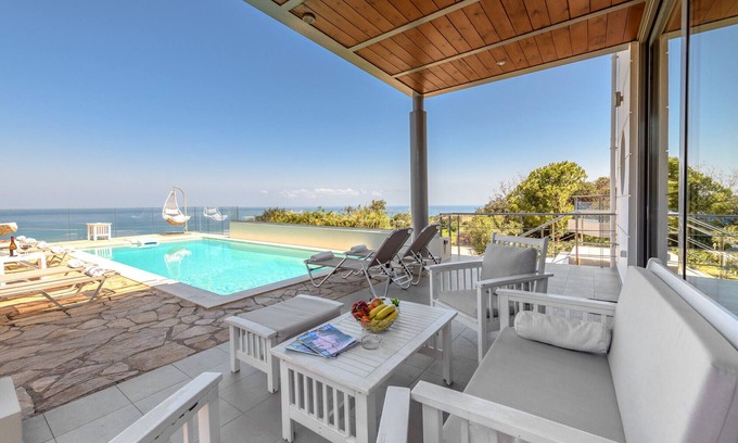 Atsipópoulon Villa | Villa Serenity: Oceanfront Retreat with Private Heated Pool