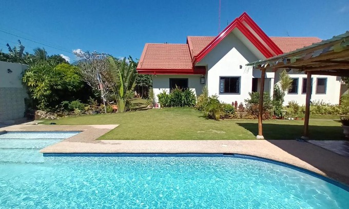 Dumaguete Bed & Breakfast | Villa Shangri-La: Family-Friendly Retreat with Pool Access