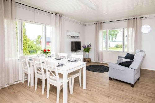 Replot Villa | Villa Sjöman: Stunning Seaview Retreat with Family Amenities
