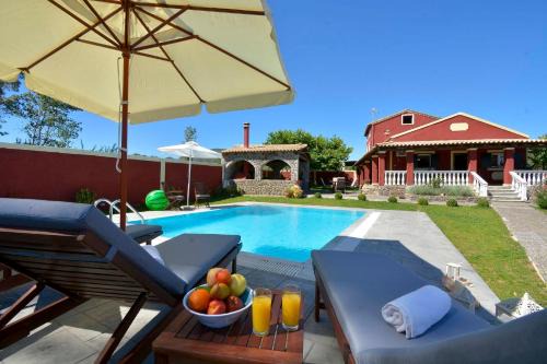 Chalikounas Villa | Villa Sofia: Oceanfront Retreat Steps from the Beach