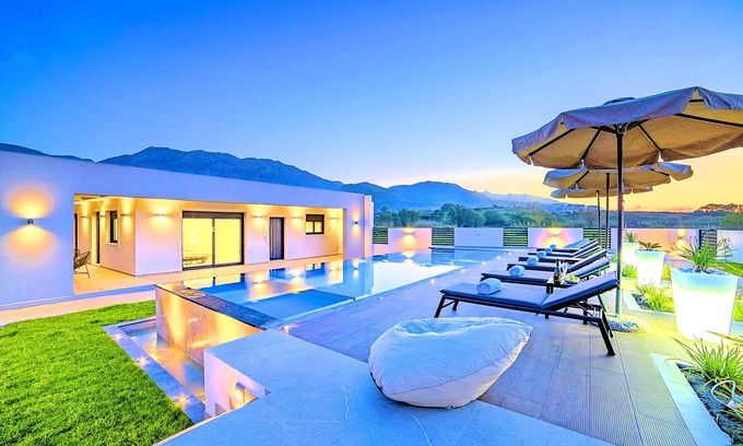 Kavros Villa | Villa Solaris: Indulge in Heated Pool & Oceanfront Bliss