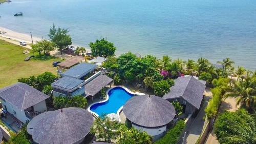 Mlonggo Resort | Villa Suerte: Oceanfront Retreat with Private Beach Access