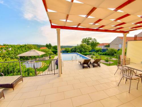 Cilipi Villa | Oceanfront Villa Sun: Rated 10/10 with Pool & Hot Tub