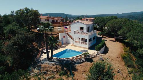 Calonge House | Experience Villa Treehouse with Oceanfront Views & Pool