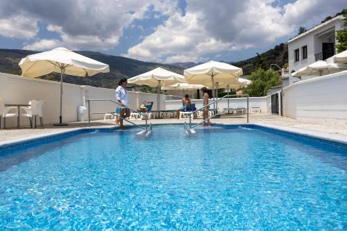 Bubion Hotel | Discover Villa Turistica de Bubion: Oceanfront Retreat