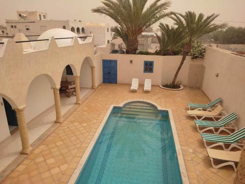 Aghir Villa | Discover Villa Ulysse Djerba: Oceanfront Family Retreat