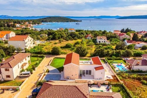 Muline Villa | Villa Vela Muline: Oceanfront Retreat with Heated Pool