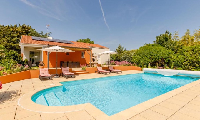 Les Sables d'Olonne Villa | Pet-Friendly Villa Les Cygnes with Pool & Kitchen Amenities