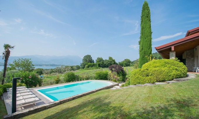 Montinelle Villa | Villa Vittoria: Lake Views & Poolside Bliss Await You