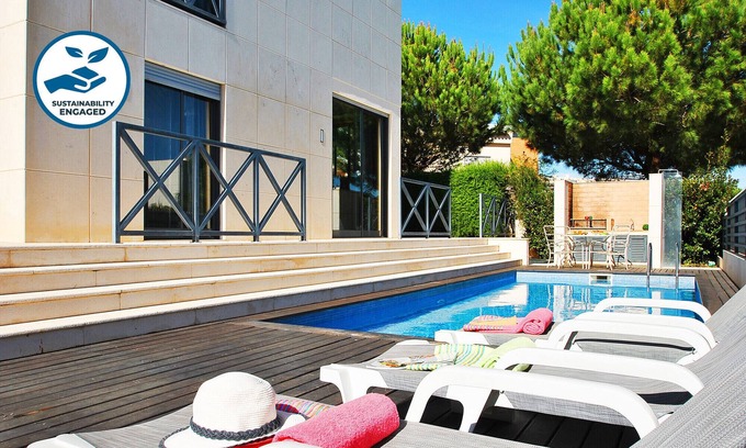 Santa Eulalia Villa | Elegant Villa with Private Pool, Steps from the Beach