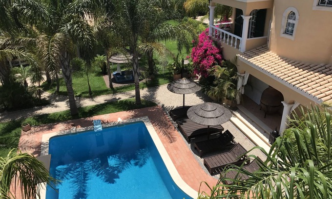 Vilamoura House | Idyllic Villa with Expansive Garden and Tennis Court