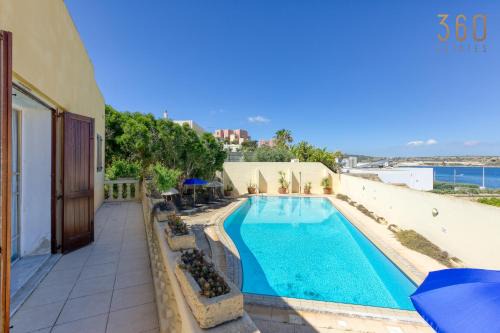 Santa Maria Estate Apartment | Scenic Villa with Pool and Ocean Views in Mellieha