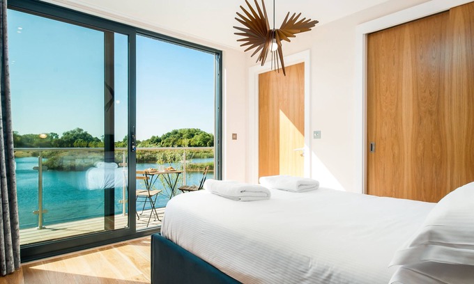 Somerford Keynes House | Exclusive Villa with Lake Access, Hot Tub & Pools Await