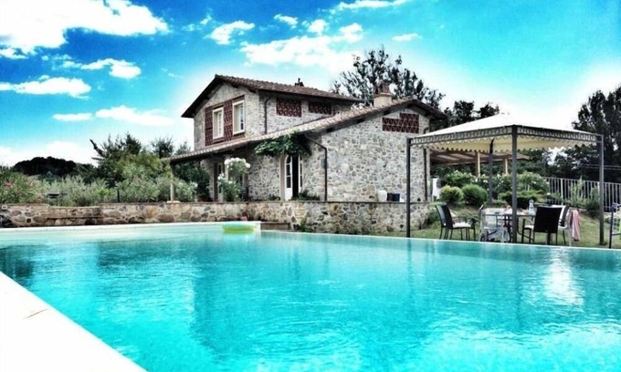Capannori Villa | Inviting Villa with Garden, Heated Pool & Oceanfront Views