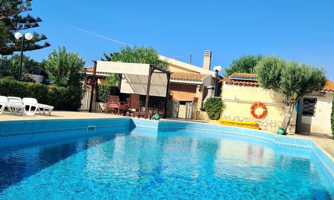 Pachino Villa | Serene Villa with Oceanfront Pool for Peaceful Getaways
