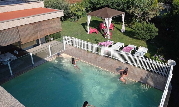 Santa Cristina de Cobres House | Inviting Villa with Pool & Ocean Views in Ría de Vigo