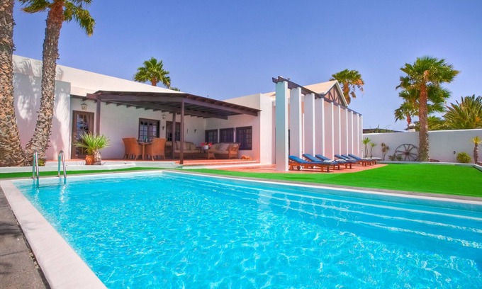 Costa Teguise Villa | Elegant Villa with Private Heated Pool and Ocean Views