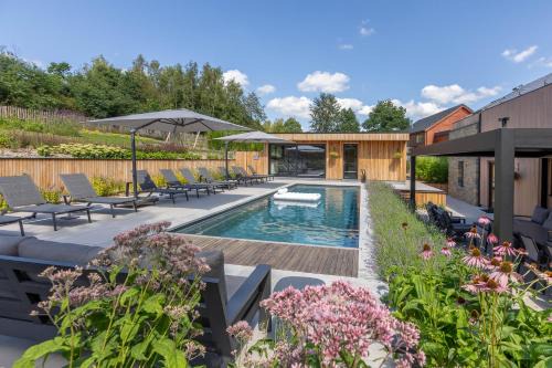 Ortheuville House | Relax at Villa Wood - Premier Gîte with Pool & Spa