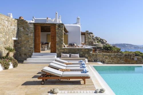 Agios Stefanos Villa | Villa Yasmina: Oceanfront Retreat with Top Guest Ratings