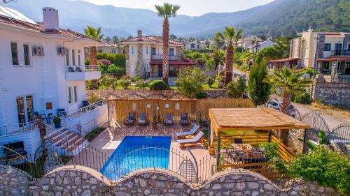 Oludeniz Villa | Oceanfront Villa Zalin: Guest Rated 9.8 with Pool Access