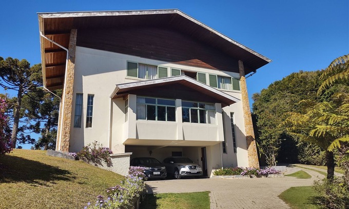 Campos do Jordao House | Cozy Village High English: Family-Friendly with Pool Access