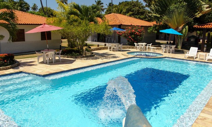 Barra Grande Ski Chalet | Relax at Village Miramar: Pet-Friendly Oceanfront Retreat