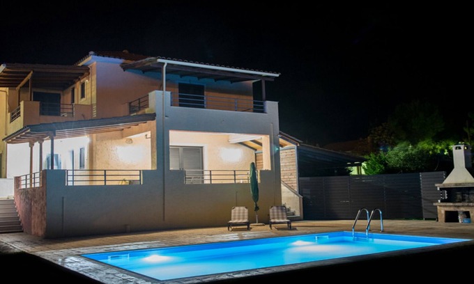 Kariotai Villa | Serene Village Villas: Relax by the Pool and Garden