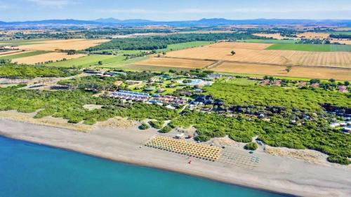 Marina di Montalto Apartment | Village with swimming-pool in Montalto Marina just 100 meters from the beach, mobile homes with air conditioning and private outdoor area