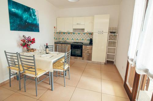 Villarios Apartment | Villarios Castello: Oceanfront Oasis with Pool and Family Fun