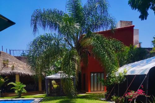 Tres de Mayo Apartment | Discover Villas de Brisas: Family-Friendly with Pool & Kitchen