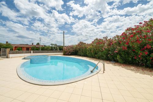 Sant'Anna Arresi House | Discover Villetta 110 e lode: Family-Friendly with Pool