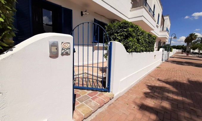 Porto Cesareo Villa | Chiusurelle Village: Pet-Friendly Retreat with Ocean Views