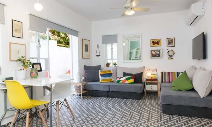 Neve Tzedek Apartment | Vintage Chic Retreat with Ocean View & Patio by FeelHome