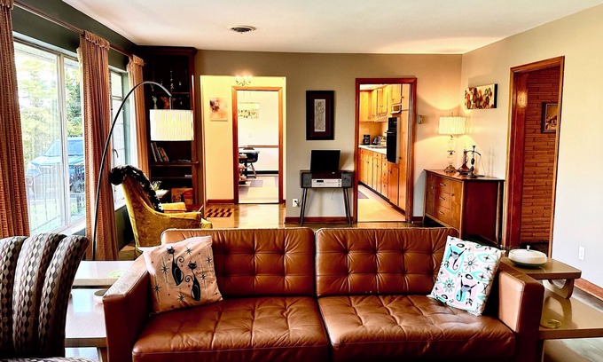 Logan House | Vintage Vibes: Mid-Century Comfort with Spa and Hot Tub