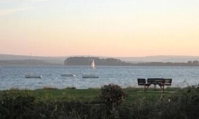 Hamworthy Apartment | Coastal Retreat: 4-Star Apartment with Sea Views & Beach Access