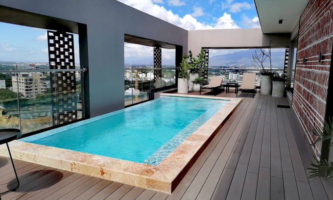 Santiago Province Apartment | Relaxing Vista Alta Paradise with Pool and Spa Amenities
