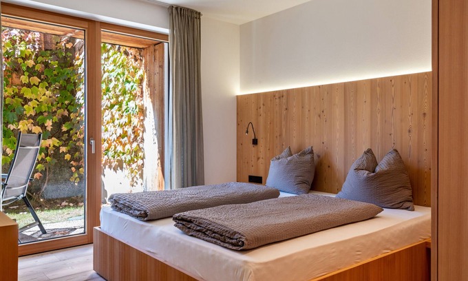 Santa Cristina Val Gardena Apartment | Vista Dolomites Apartment with Mountain View & Private Garden