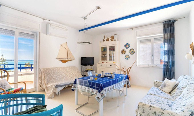 Porto Cesareo Apartment | Colus Apartment: Steps from the Sea with Oceanfront Views