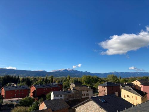 Llivia Apartment | Stunning Mountain Views for Families at Tensi Home Llivia